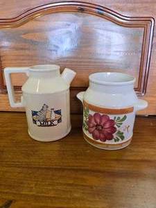 lot 93 image: Vintage Ceramic pitcher with chicken and a pitcher with kitchen measurements