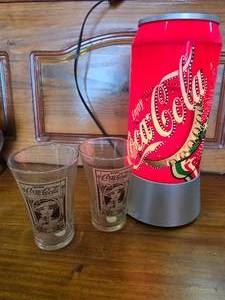 Spinning coke lot with 2 coke glasses