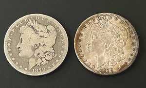 lot 11 image: Pair of 1879-O Morgan Silver Dollars