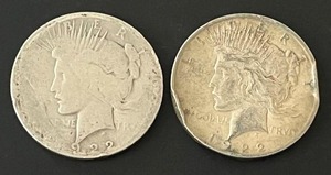 lot 21 image: Pair of 1922 Peace Dollars