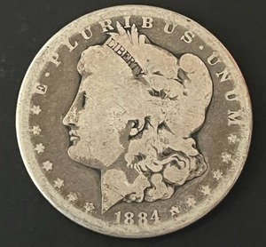 lot 23 image: 1884-S Morgan Silver Dollar