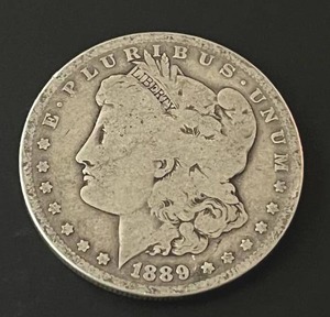 lot 29 image: 1889-O Morgan Silver Dollar
