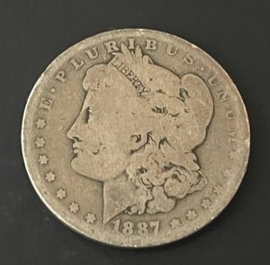 lot 27 image: 1887-O Morgan Silver Dollar