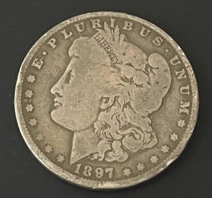 lot 31 image: 1897-O Morgan Silver Dollar