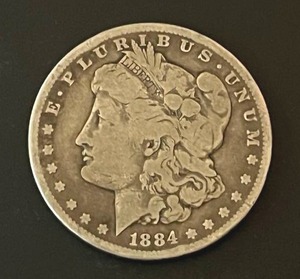 lot 44 image: 1884-S Morgan Silver Dollar