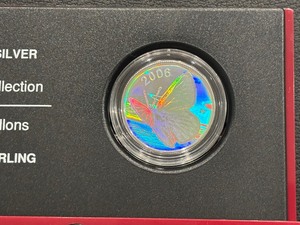 lot 92 image: 2006 Canada Silvery Blue .925 Silver Half Dollar