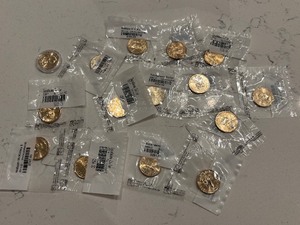 lot 100 image: Uncirculated Dollar Coins