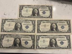 lot 70 image: Blue Seal $1 Dollar Silver Certificates