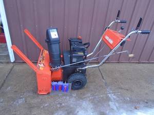 lot 107 image: Yard Man Snow Wolf 4 hp 22� snow blower. Used condition. Tested & works. As shown.