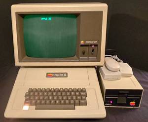 lot 181K image: LL-FR - Vintage Apple II Plus Computer System with Disk Drive, Monitor, Accessories, and Vintage Games