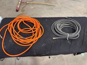 lot 1077 image: Two 50ft Air Hoses