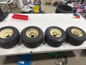 lot 1091 image: Four Non-Highway Tires with Rims