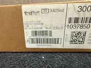 lot 129 image: 30 Packs Of Tositos Nacho Cheese Dip