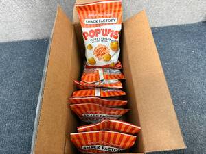 lot 155 image: Box of Snack Factory Pop Ums