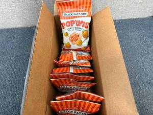 lot 153 image: Box of Snack Factory Pop Ums