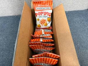 lot 166 image: Box of Snack Factory Pop Ums