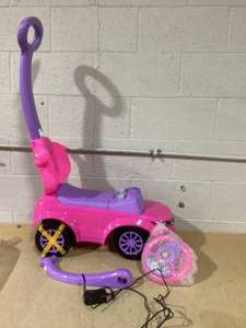 lot 479 image: Costway 3 in 1 Ride on Push Car Toddler Stroller Sliding Car Pink