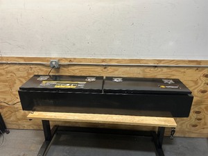 lot 41 image: Northern Tool  Equipment Top-Mount Truck Toolbox, 72in. x 12in. x 16in., Steel, Gloss Black, T-Handle Latches MSRP $579.99