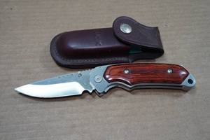lot 10 image: Buck Knives Folding Knife