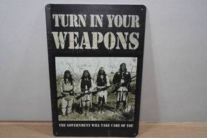 lot 96 image: Novelty Metal Sign - Turn in Your Weapons