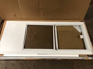 lot 85 image: EMCO 34 in. x 80 in. White Universal 34-Light Vinyl Storm Door Damaged Customer Returns See Pictures