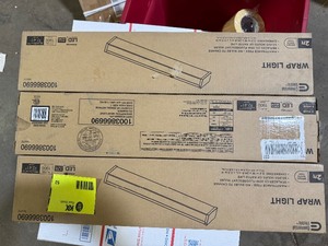 lot 52 image: Lot of 3 2 ft. 120-Volt 1900 Lumens White integrated LED Wraparound Light with Prismatic Lens customer return see pictures