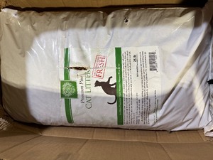 lot 54 image: Premium Pine Cat Litter 25 Lb Bag customer return see pictures