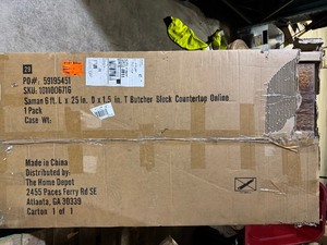 lot 86 image: Hampton Bay 4 ft. L x 25 in. D Finished Saman Solid Wood Butcher Block Countertop see pictures