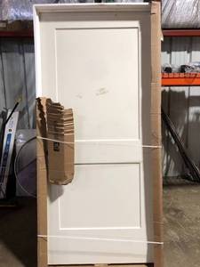 lot 157 image: JELD-WEN 36 in. x 80 in. 2 Panel Monroe Primed Right-Hand Smooth Solid Core Molded Composite MDF Single Prehung Interior Door Customer Returns See Pictures