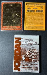 lot 17A image: 1998 Fleer Premiere Edition Michael Jordan Basketball Gold (1986 Replica Rookie Card Plated in 23 Karat Gold) Chicago Bulls Basketball Card 36845000