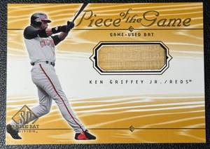 lot 21A image: 2000 SP Ken Griffey Jr. �Piece of the Game� GAME USED Bat Piece Cincinnati Reds Baseball Card #KG