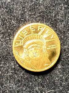 lot 01 image: 110TH OZ .9999 PURE GOLD MONEY METALS EXCHANGE ROUND