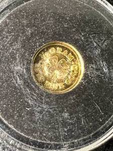 lot 03 image: HALF GRAM .9999 FINE GOLD MONARCH METALS ROUND IN CASE