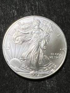 lot 21 image: 2014 AMERICAN SILVER EAGLE 1 TROY OZ .999 FINE SILVER