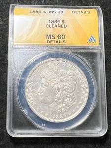 lot 27 image: 1886 US MORGAN SILVER DOLLAR ANACS MS60 DETAILS