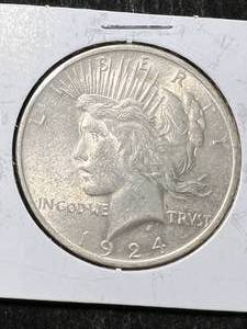 lot 44 image: 1924 US PEACE SILVER DOLLAR