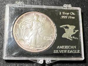 lot 54 image: 1990 AMERICAN SILVER EAGLE 1 TROY OZ .999 FINE SILVER IN CASE