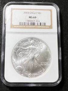 lot 57 image: 2003 AMERICAN SILVER EAGLE NGC MS69
