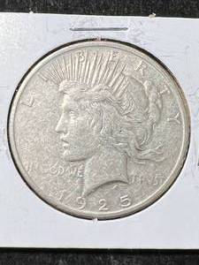 lot 60 image: 1925 US PEACE SILVER DOLLAR