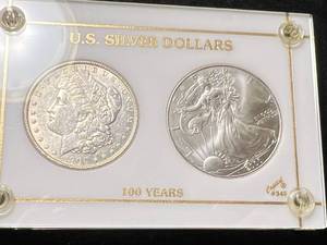 lot 63 image: 1900 US MORGAN SILVER DOLLAR WITH 2000 AMERICAN SILVER EAGLE IN CASE