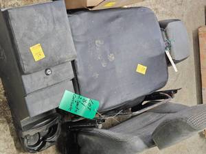 2 SALVAGED DEFENDER SEATS PLUS CENTER CONSOLE