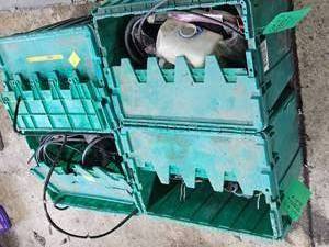 FOUR GREEN TOTES - RANDOM DEFENDER PARTS