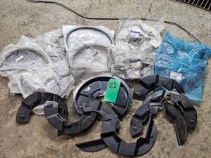 BOX OF METAL MUD SHIELDS - ASSORTED SIZES
