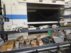 SUSPENSION COMPONENTS OTHER CONTENTS ON SHELVES (mid section of rack)