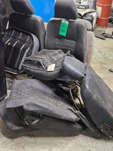 PILE OF SALVAGED LAND ROVER SEATS