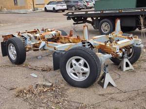 SALVAGED DEFENDER CHASSIS INCLUDING AXELS, WHEELS, TIRES AND SUSPENSION&nbsp