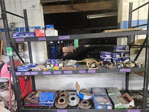 LAND ROVER BRAKE COMPONENTS - CONTENTS ON 3 SHELVES (left end of rack)