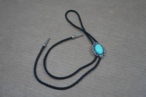 lot 102 image: Large Stone Turquoise Navajo Style Bolo Tie