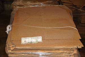 lot 150 image: $10 and  Pallet of Cardboard Sheets