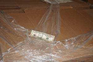 lot 153 image: $10 and  Pallet of Cardboard Sheets